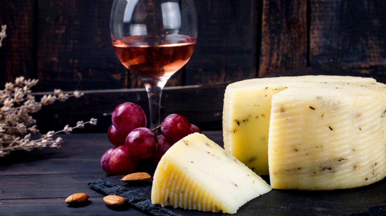 cheese head, glass of wine and nats