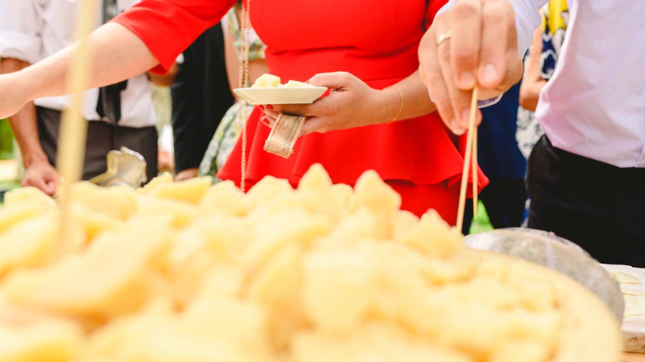 People enjoying italian parmesan cheese